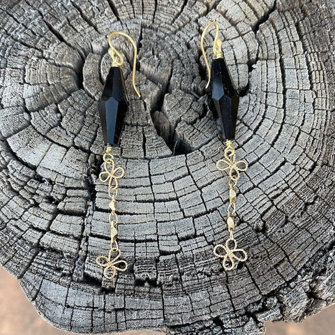 Black crystal earrings with golden flower chain