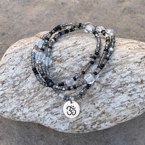 Stretch necklace or triple wrap bracelet with sterling Om charm