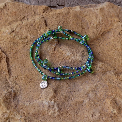 Stretch necklace or triple wrap bracelet with green and blue seed beads and a sterling tiny heart charm