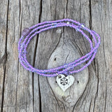 Stretch necklace or triple wrap bracelet with a hand stamped snowflake charm