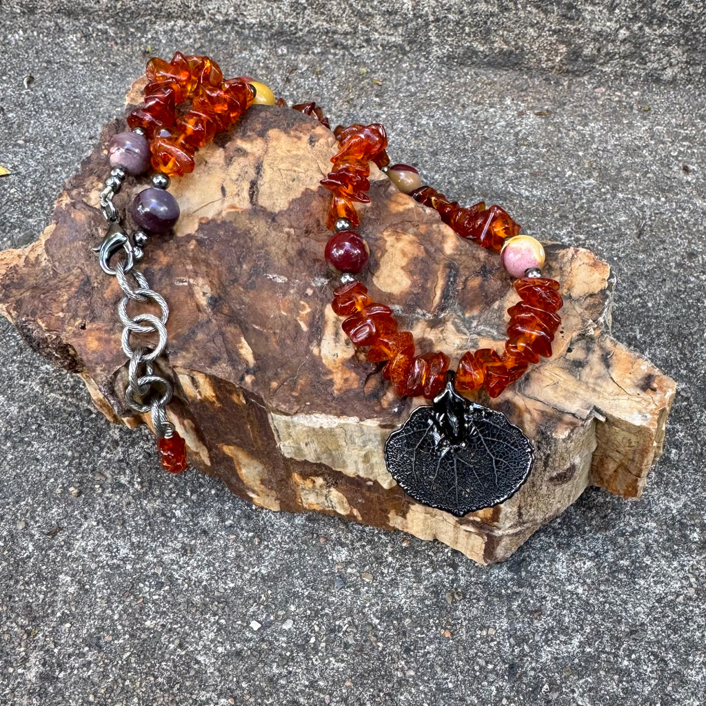 Baltic Amber necklace with a dark metal Aspen leaf pendant