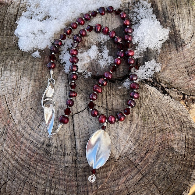 Crimson pearl necklace with sterling silver leaf pendant