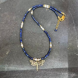 Lapis and freshwater pearl necklace with bronze dragonfly pendant