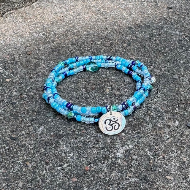 Stretch necklace or triple wrap bracelet with sterling Om charm