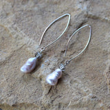 Elegant baroque pearl earrings on silver plated long oval ear wires with Swarovski crystals