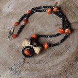 Long tassel necklace with red and black agate