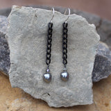 Earrings with black chain and Swarovski pearls and crystals.