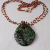 Green chrysocolla stone pendant necklace on doubled copper chain