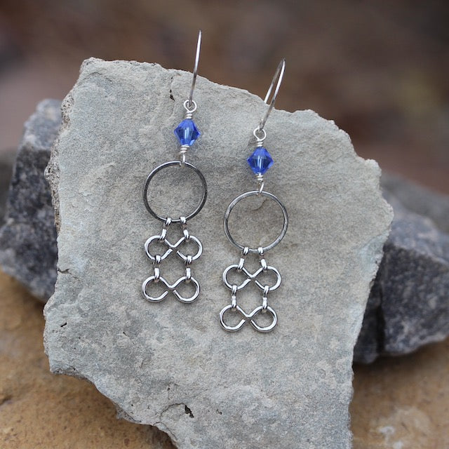 Statement chain earrings with sapphire blue Swarovski crystals.