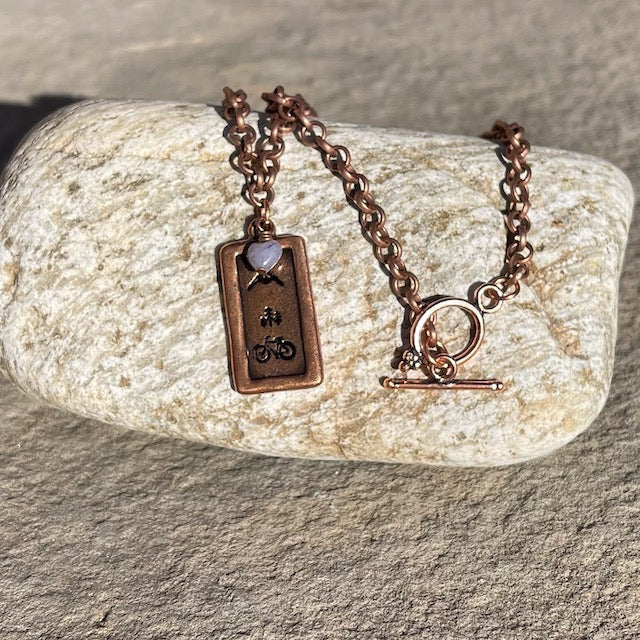 Stamped copper pendant necklace