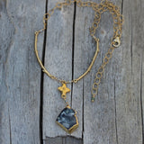 Gold rimmed druzy pendant necklace on gold filled chain with brass flower focal and brass branches