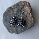 Earrings with handcrafted black and purple glass beads