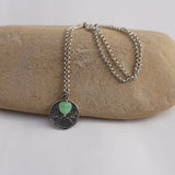 Pewter weight plate pendant with green glass heart on sterling chain necklace