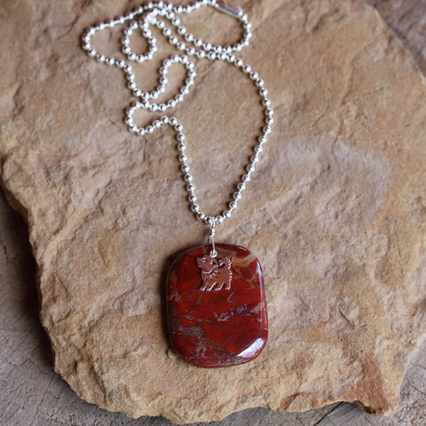 Red agate stone pendant necklace with sterling puppy charm