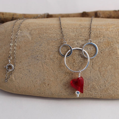 Sterling silver chain necklace with circles and Swarovski crystal heart pendant