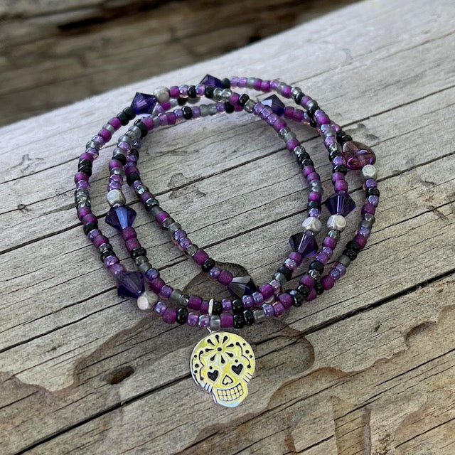 Stretch necklace or triple wrap bracelet with silver sugar skull charm