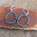 Turquoise seed bead hoop earrings with orange crystals and sterling silver lever back ear wires