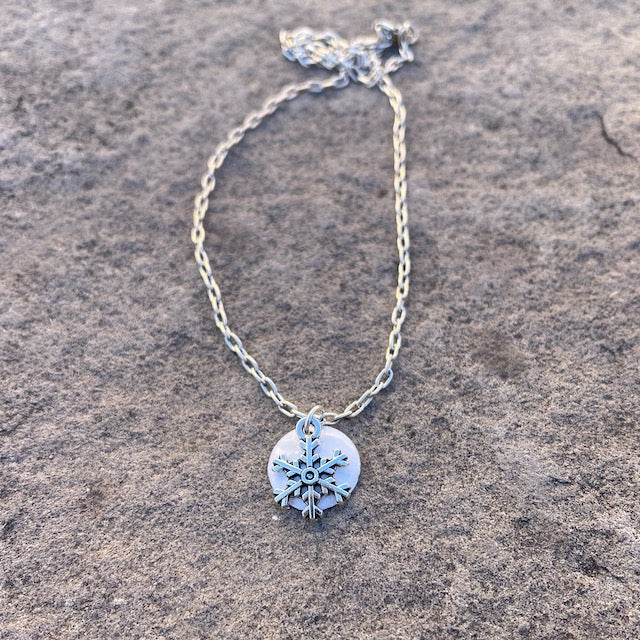 Enamel and snowflake pendant necklace
