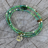 Bike charm stretch necklace or triple wrap bracelet with green seed beads and Swarovski crystal accents