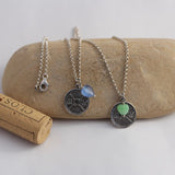 2 sterling chain necklaces with weight plate pendants and blue or green glass heart