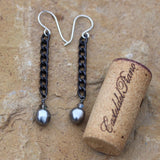 Black chain earrings with gray Swarovski pearls and crystals and sterling silver French ear wires. Cork shown for size reference.