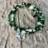 Stretch necklace or triple wrap bracelet with green beads and a sterling unicorn charm