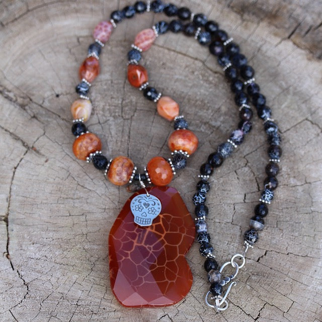 Red agate stone pendant necklace with sugar skull charm and red and black agate beads