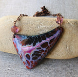 Brilliant maroon to pink colored copper enamel pendant necklace on copper chain.