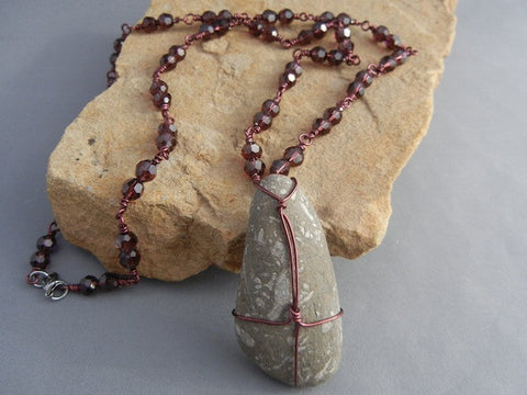 Selkirk stone pendant necklace wrapped with red wire