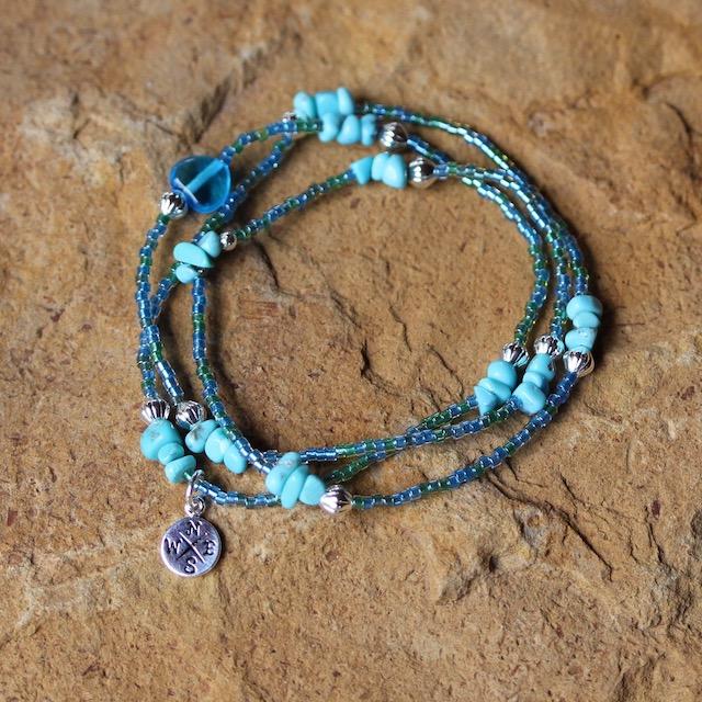 stretch triple wrap bracelet with turquoise and compass charm
